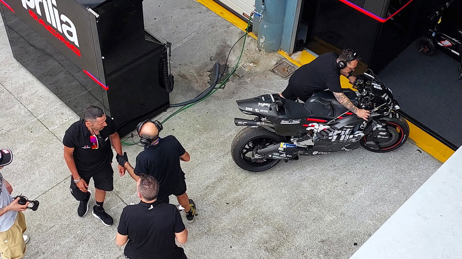 Jorge Martin's Aprilia returns to the pits after his second Sepang crash on Wednesday morning (pic: Peter McLaren).